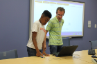 Philip Kilinskas, a research scientist in the CUBS lab of the Department of Computer Science and Engineering, gave a fingerprint identification demo. Students were invited to scan the same fingerprint twice to see how the software could identify the common features between the two scans.