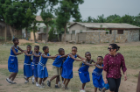 School of Management undergraduate Hira Kashif leads a group of children at the Bawaleshie School in Ghana. Photo: Anthony Falvo