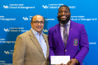 Kalan Norris — pictured at right with Prasad Balkundi, associate professor and chair of organization and human resources — was recognized with the Dean’s Award for Teaching Excellence.