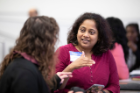 Sudha Bommidi talks with another participant during a learning track. 