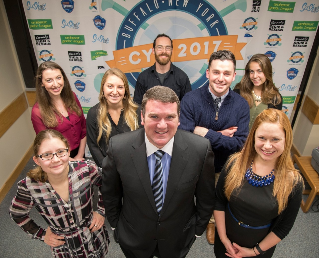 Zoom image: Management interns lead marketing and sponsorship for the CYC. Back row, from left: Elyssa Mountain, BS ’18; Lauren Gates-Sandburg, BS ’18; James Omps, volunteer; Alec LaCorazza, BS ’17; Daryl Rosh, BS ’18. Front row: Jenah Hernek, BS ’17; Padraic Walsh, organizing committee chair; Megan Corcoran, BS ’09, PMBA ’18, intern coordinator. Photo: Tom Wolf 