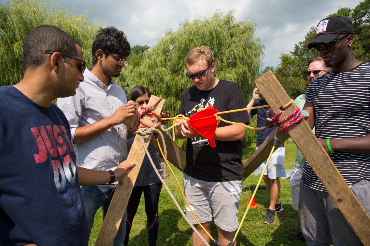 In one activity, MBA students worked with their teams to successfully build a catapult. 