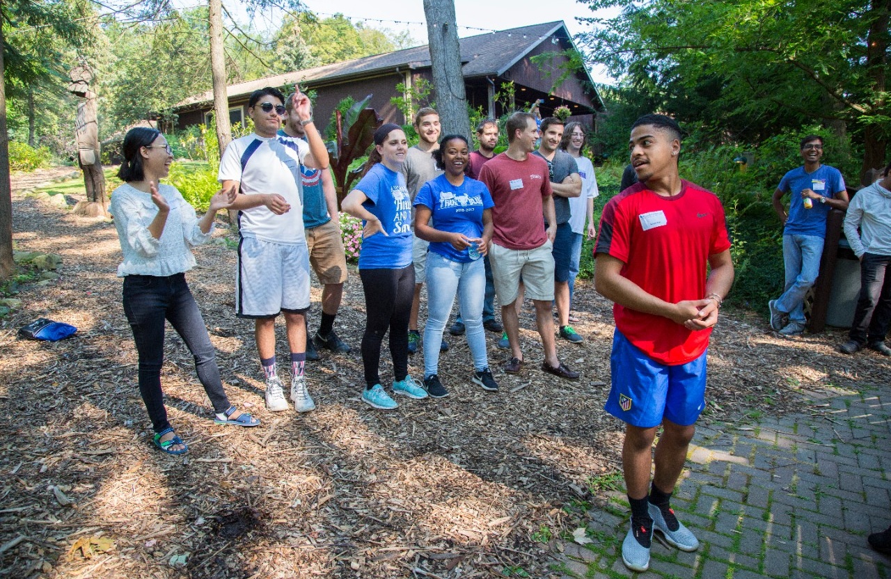 During another challenge, MBAs had to devise a way to keep a cup of water from spilling while the person holding it was flipped upside down.