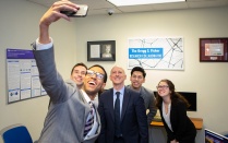 Gregg Fisher takes a selfie with students in the Fisher Research Collaborative. Read his profile in this issue of Buffalo Business. 