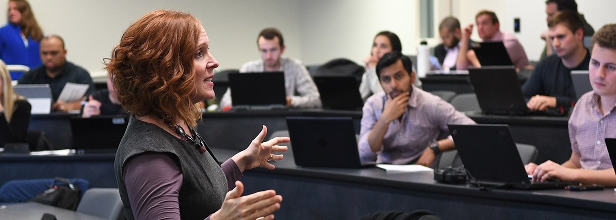 Zoom image: Cichocki teaching in Alfiero Center. Photo: Nancy J. Parisi 