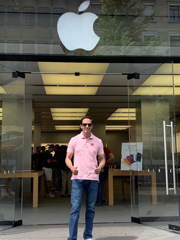 Sharma outside an Apple store. 