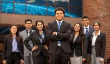 Students stand outside Jacobs Management Center. Read the Startups section in this issue of Buffalo Business. 