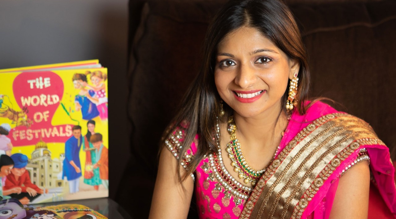 Akruti Babaria with some of the children's books her company sells. 