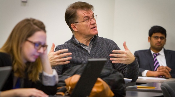 Bob Neubert giving feedback in the classroom. 