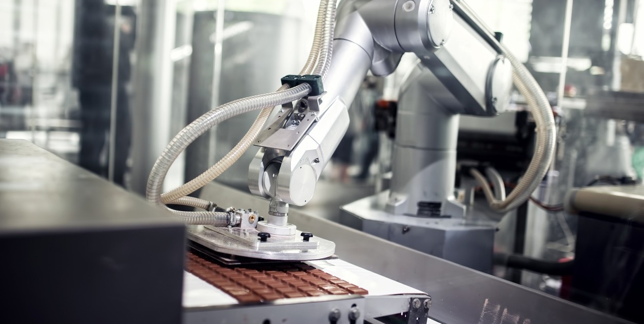 Robot in a chocolate factory. 