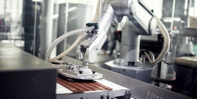 Robot in a chocolate factory. 