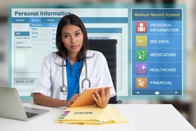 Doctor looking at medical records. 