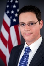Adam Storch. 