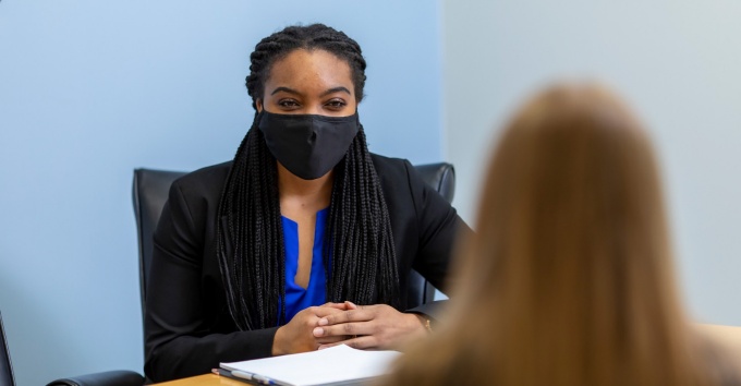 Sydney Merritt practices a job interview. 