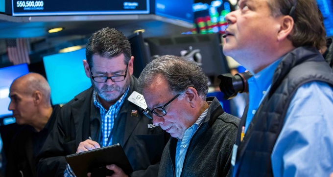 Traders on the floor of the New York Stock Exchange. 