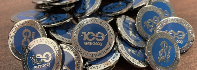Centennial pins. 