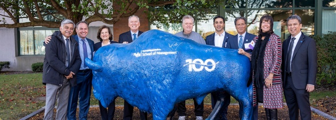 Awardees pose at Paint-A-Bull. 