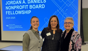 Lauren Daniele, MBA ’26, with WNY Women’s Foundation CEO Sheri Scavone, and board member Arlene Kaukus. 
