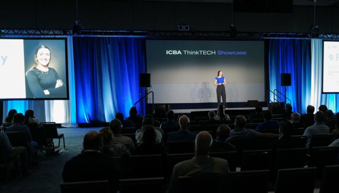Alexandra McLeod, MBA ’17 presenting on stage. 