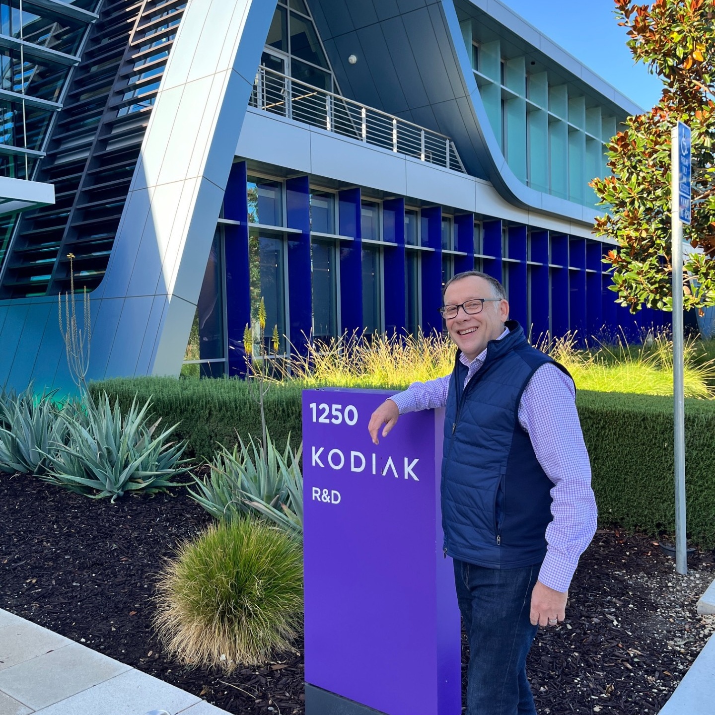Zoom image: John Borgeson, BS &rsquo;83, outside Kodiak Sciences R&amp;D Building in Palo Alto, California. 