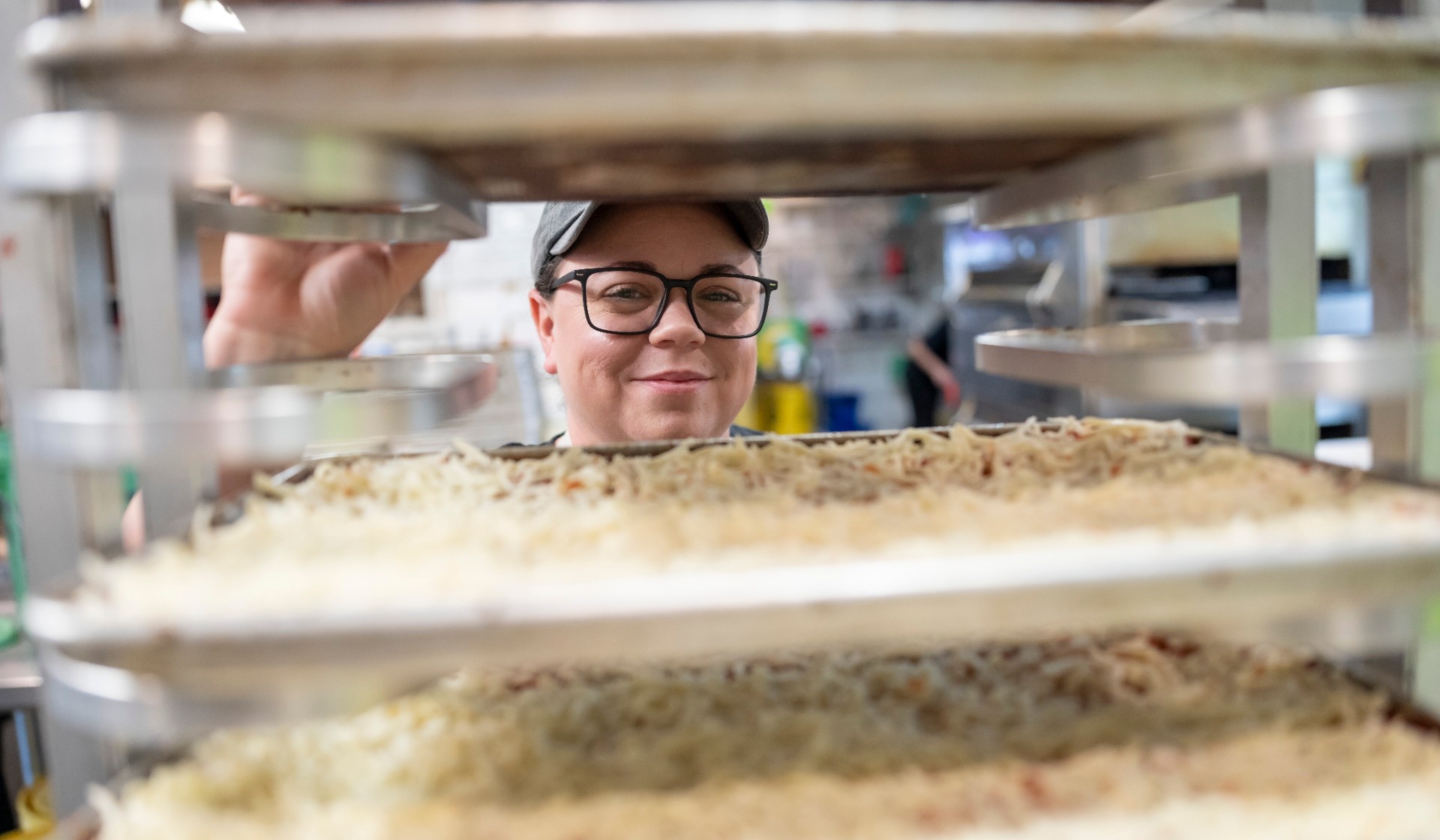 Zoom image: Meghan Moynihan, BS &rsquo;06, at One Pie Pizza Co. in West Seneca, N.Y. Photo: Tom Wolf 