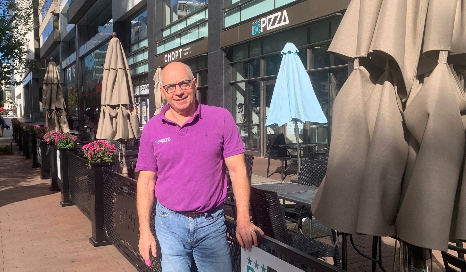 Zoom image: Bob Daly, BS &rsquo;84, outside DC Pizza in Washington, D.C. 