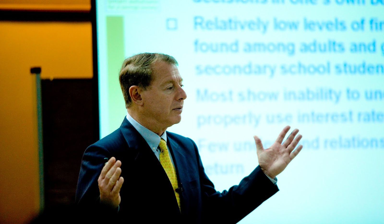 Lewis Mandell presenting an open lecture. 