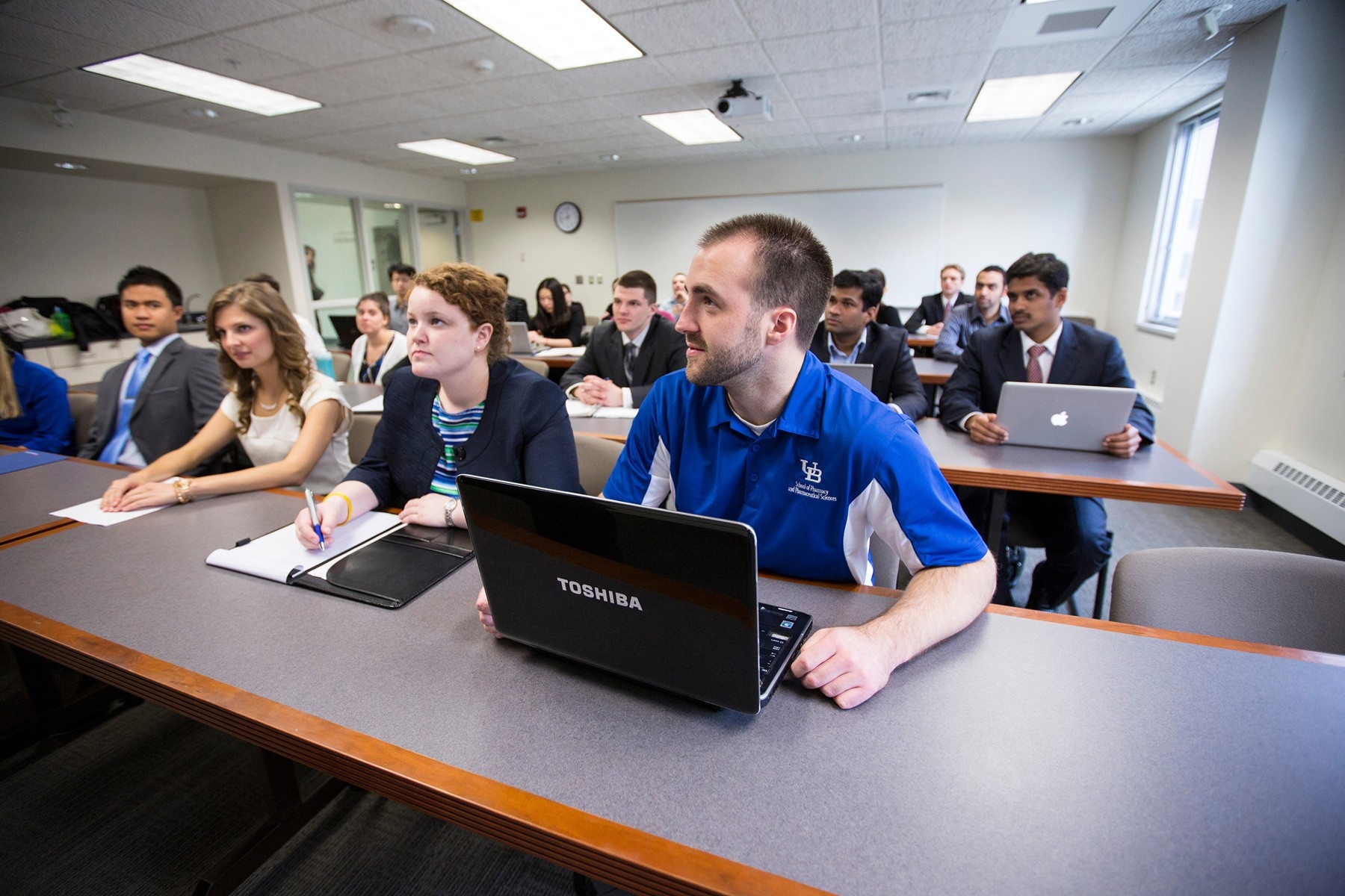 Students in a lecture hall. 