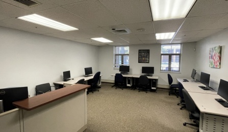 Computer lab with workstations. 