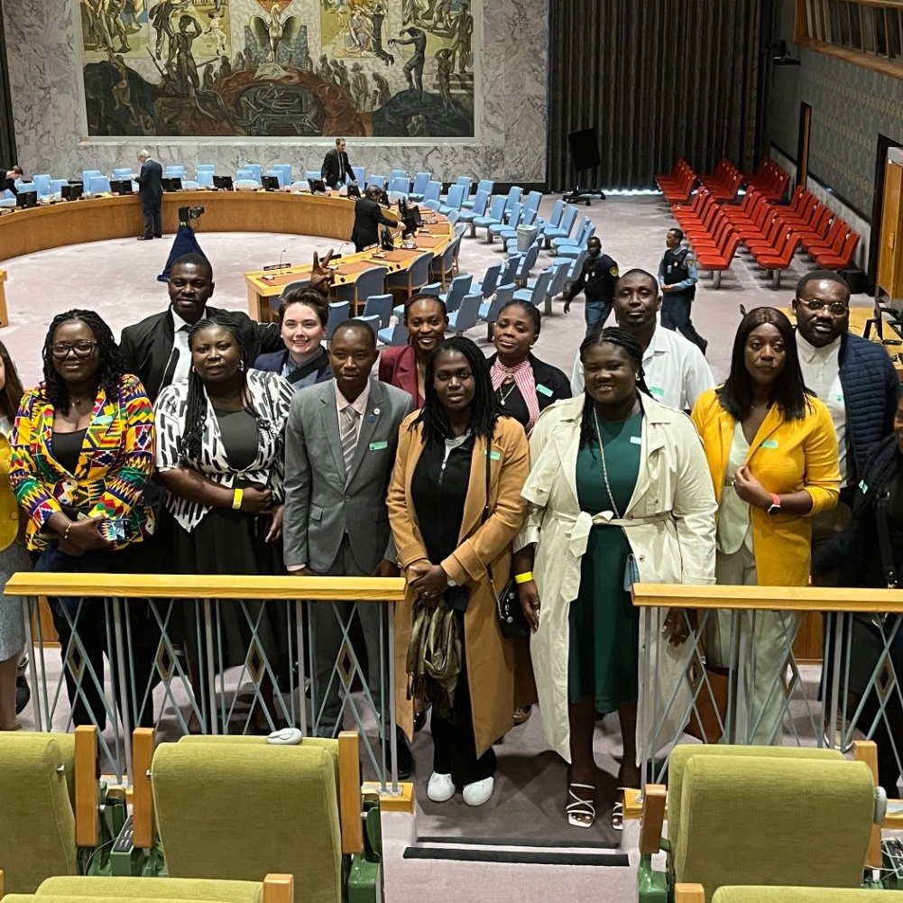 Global Leadership students standing in the UN Security Council Chamber. 