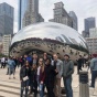 Students standing in front of the Bean sculpture in Chicago. 