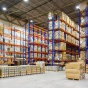 Boxes on shelves in a warehouse. 