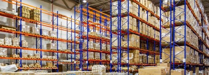 Boxes on shelves in a warehouse. 