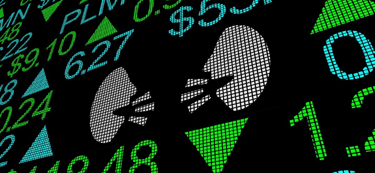 Digital board with numbers and graphics of two people talking.