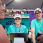 Rachael (left) and Michael Krupski, owners of The Silly Yak, talk with customers at the Erie County Fair. This is their first year serving up gluten-free fair food. 