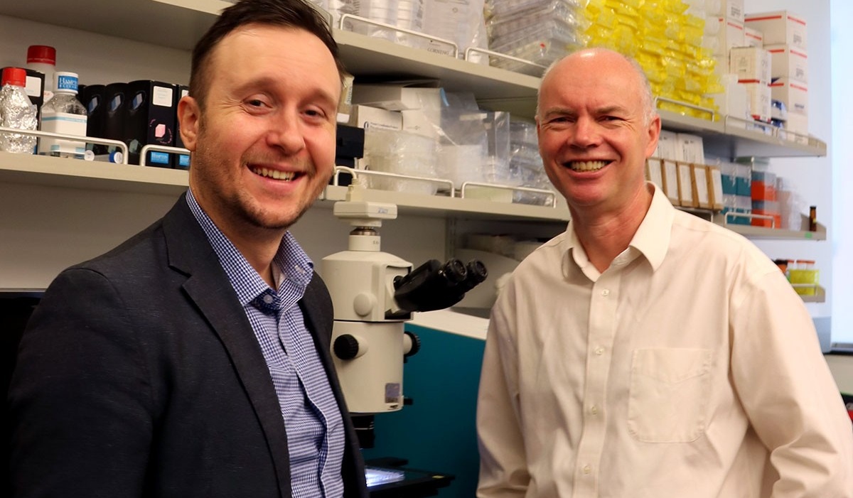 Sellitto and Snell in a lab at the Hauptman-Woodward Medical Research Institute. 