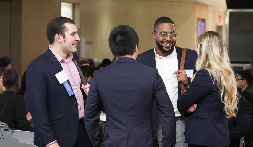 Group of alumni and students connecting at Network New York. 