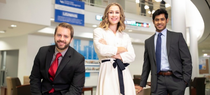 Three MS Finance students. 