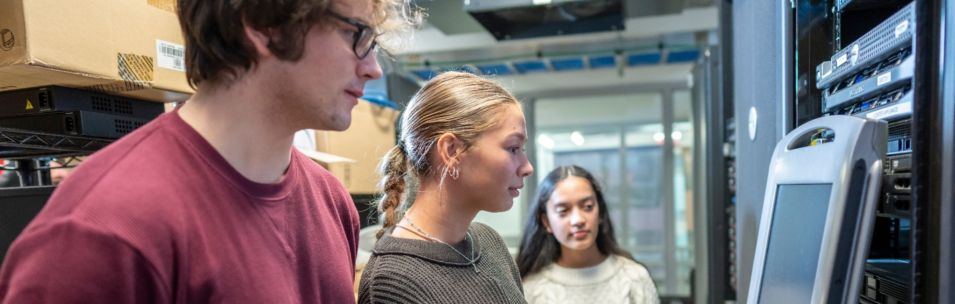 Students experimenting with computer hardware.