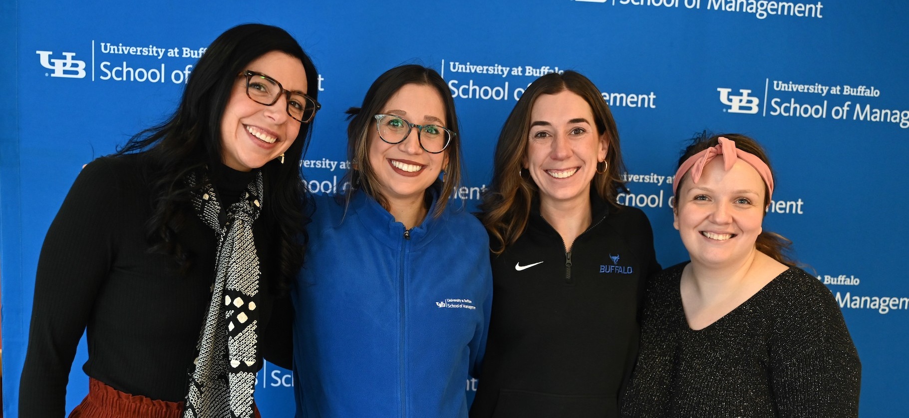 Four PhD students. 