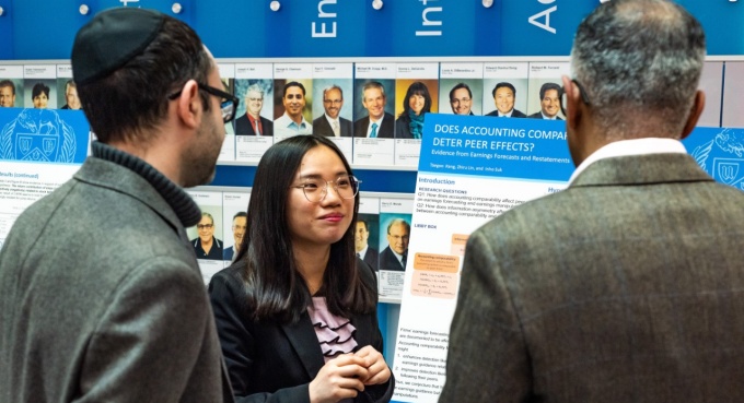Accounting PhD student at the PhD Showcase poster presentation. 