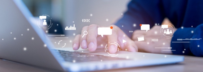 close up on man hand using tab pad on laptop to working about futuristic of social media marketing icon for internet network technology and business concept. 