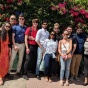 Students standing in front of flowers in Costa Rica. 
