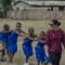 Hira Kashif leads a group of Ghanaian schoolchildren. 